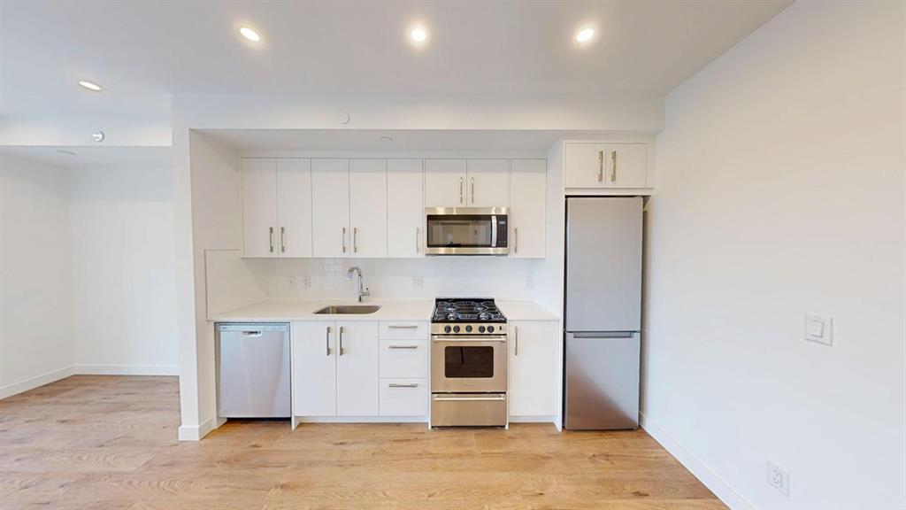 416-110 18a St Nw