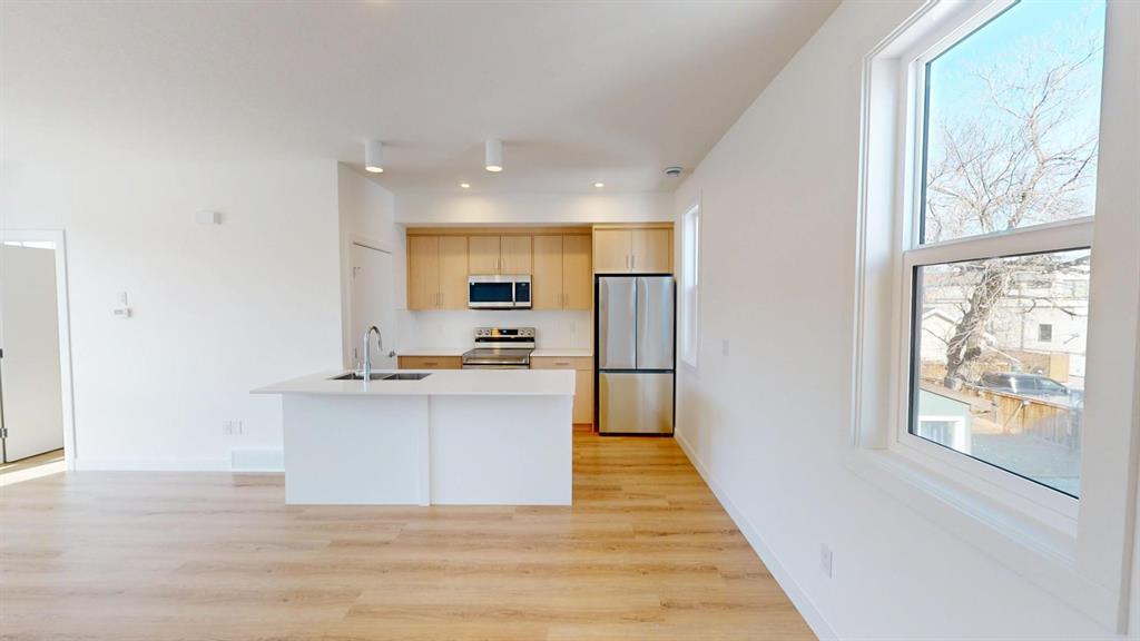 102, 3528 3 Ave NW
